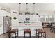 Spacious kitchen featuring white cabinetry and a large island at 22917 E Camina Buena Vis, Queen Creek, AZ 85142