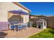 Patio with table, chairs, and playhouse at 22917 E Camina Buena Vis, Queen Creek, AZ 85142