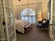 Charming bedroom with arched window and French doors at 2305 Fox Tail --, Carefree, AZ 85377