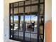 Modern black framed French doors opening to patio at 2305 Fox Tail --, Carefree, AZ 85377