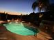 Lighted pool and spa at night at 2305 Fox Tail --, Carefree, AZ 85377