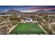 Luxury estate with a putting green, pool, and mountain views at 24258 N 91St St, Scottsdale, AZ 85255