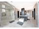 Modern bathroom with a large walk-in shower and marble finishes at 24258 N 91St St, Scottsdale, AZ 85255