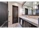 Elegant bathroom with a double vanity and a large mirror at 24258 N 91St St, Scottsdale, AZ 85255