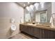 Modern bathroom with double sinks and sleek design at 24258 N 91St St, Scottsdale, AZ 85255