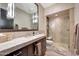 Modern bathroom with a large vanity and a walk-in shower at 24258 N 91St St, Scottsdale, AZ 85255