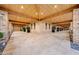 Covered patio with brick columns and stone tile flooring at 24258 N 91St St, Scottsdale, AZ 85255