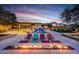 Stunning pool and fire pit area with modern seating at 24258 N 91St St, Scottsdale, AZ 85255