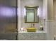 Luxury powder room with gold sink and stone vanity at 24258 N 91St St, Scottsdale, AZ 85255