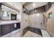 Spacious walk-in shower with glass enclosure and tiled walls at 24258 N 91St St, Scottsdale, AZ 85255