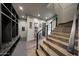 Modern stairwell with tiled flooring and storage at 24258 N 91St St, Scottsdale, AZ 85255