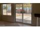 View of backyard through sliding glass doors at 2429 E Calypso Ave, Mesa, AZ 85204