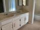 Bathroom with double vanity and tiled floor at 2429 E Calypso Ave, Mesa, AZ 85204