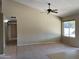 Spacious living room with vaulted ceiling and carpeting at 2429 E Calypso Ave, Mesa, AZ 85204