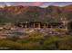 Modern clubhouse with mountain views at sunset at 24642 N 123Rd Pl, Scottsdale, AZ 85255