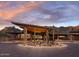 Modern clubhouse entrance with a desert landscape at 24642 N 123Rd Pl, Scottsdale, AZ 85255