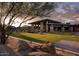 Outdoor patio area with artificial turf and seating at 24642 N 123Rd Pl, Scottsdale, AZ 85255