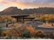 Gated community entrance with mountain views at sunset at 24642 N 123Rd Pl, Scottsdale, AZ 85255