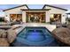 Inviting spa with fire pit and spacious backyard access at 24642 N 123Rd Pl, Scottsdale, AZ 85255