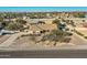 Aerial view showing single-story house, detached shop, and expansive lot at 2602 S 226Th Dr, Buckeye, AZ 85326