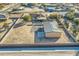 Aerial view showing house, detached shop, and expansive desert lot at 2602 S 226Th Dr, Buckeye, AZ 85326