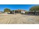 Large backyard with covered patio and spacious area at 2602 S 226Th Dr, Buckeye, AZ 85326