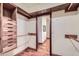 Large walk-in closet with ample shelving and hanging space at 2602 S 226Th Dr, Buckeye, AZ 85326