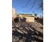 Sun-drenched backyard with gravel landscaping and a covered patio at 26034 S Glenburn Dr, Sun Lakes, AZ 85248