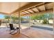 Relaxing covered patio overlooking the backyard at 26034 S Glenburn Dr, Sun Lakes, AZ 85248