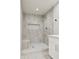 Updated shower with built-in seat and stylish tile at 26034 S Glenburn Dr, Sun Lakes, AZ 85248