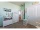 Bedroom with dresser, closet, and wall decor at 31063 W Cheery Lynn Rd, Buckeye, AZ 85396