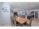 Dining area with light wood table and dark chairs at 31063 W Cheery Lynn Rd, Buckeye, AZ 85396