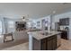 Open kitchen with island, looking toward living room at 31063 W Cheery Lynn Rd, Buckeye, AZ 85396