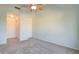 Bedroom with ceiling fan and double door closet at 3134 E Mckellips Rd # 168, Mesa, AZ 85213