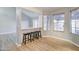 Bright breakfast nook with three stools and view into the kitchen area at 3134 E Mckellips Rd # 168, Mesa, AZ 85213