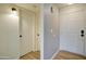 Clean entryway with light walls, wood-look floors and interior doors at 3134 E Mckellips Rd # 168, Mesa, AZ 85213