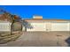 Front view of attached two-car garage with driveway at 3134 E Mckellips Rd # 168, Mesa, AZ 85213