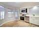 Modern kitchen with stainless steel appliances and white cabinets at 3134 E Mckellips Rd # 168, Mesa, AZ 85213