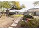 Spacious backyard with stone path and shed at 3715 N 9Th Pl, Phoenix, AZ 85014