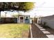 Landscaped backyard with shed and stone pathway at 3715 N 9Th Pl, Phoenix, AZ 85014