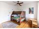 bedroom with bunk beds, a small table, and plenty of natural light at 3715 N 9Th Pl, Phoenix, AZ 85014