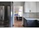 Modern kitchen with gray and white cabinets and stainless steel appliances at 3715 N 9Th Pl, Phoenix, AZ 85014