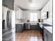 Modern kitchen with stainless steel appliances and terracotta tile floor at 3715 N 9Th Pl, Phoenix, AZ 85014