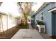 Side yard with playhouse and concrete patio at 3715 N 9Th Pl, Phoenix, AZ 85014