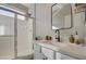 Bathroom with walk-in shower, vanity, and mirror at 3740 S 182Nd Ln, Goodyear, AZ 85338