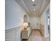 Bright entryway with wood-look floors and a console table at 3740 S 182Nd Ln, Goodyear, AZ 85338