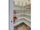 Well-organized pantry with ample shelving for storage at 3740 S 182Nd Ln, Goodyear, AZ 85338