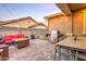 Backyard with patio furniture, fire pit, and grill at 3894 E Ebano St, Gilbert, AZ 85295