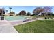 Community outdoor basketball court with a bench at 3894 E Ebano St, Gilbert, AZ 85295