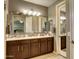 Modern bathroom with double vanity and large mirror at 3894 E Ebano St, Gilbert, AZ 85295